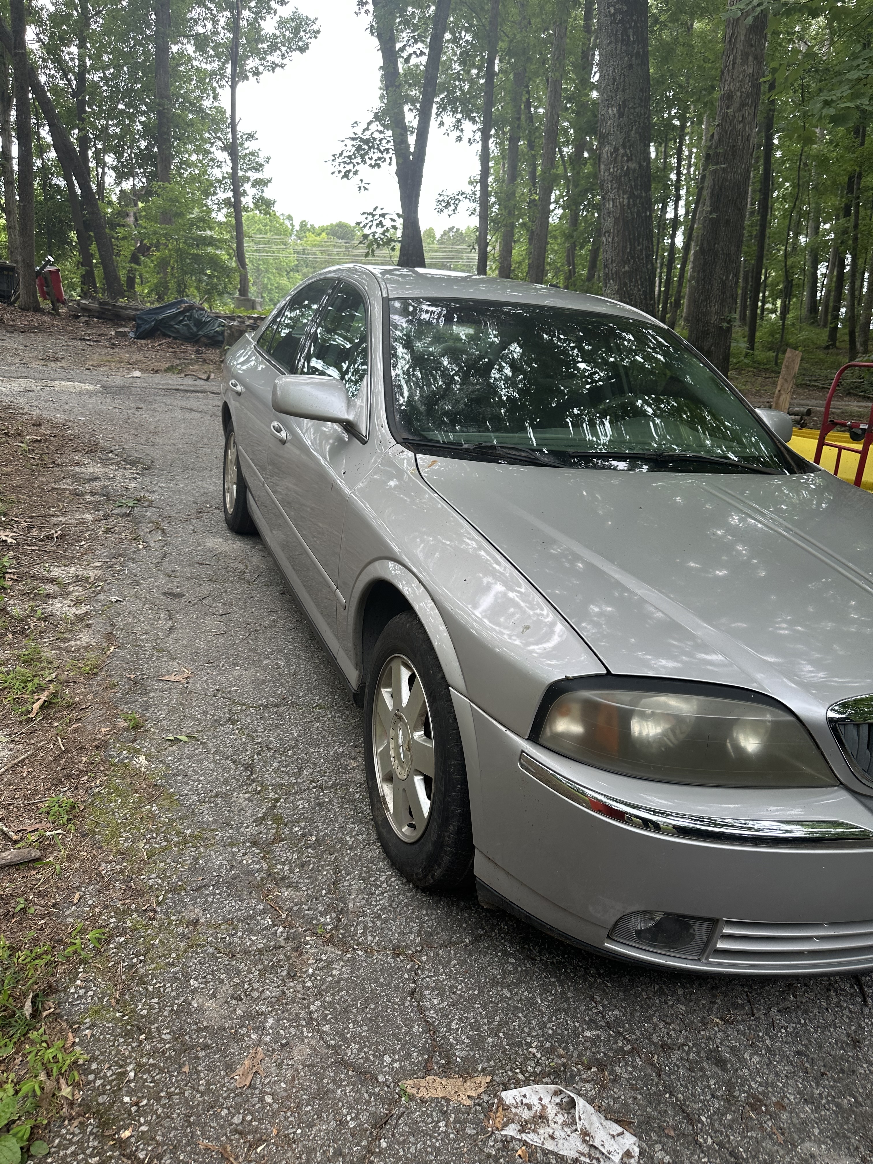 Little Sally — 2003 Lincoln LS, post-wash in the drive.